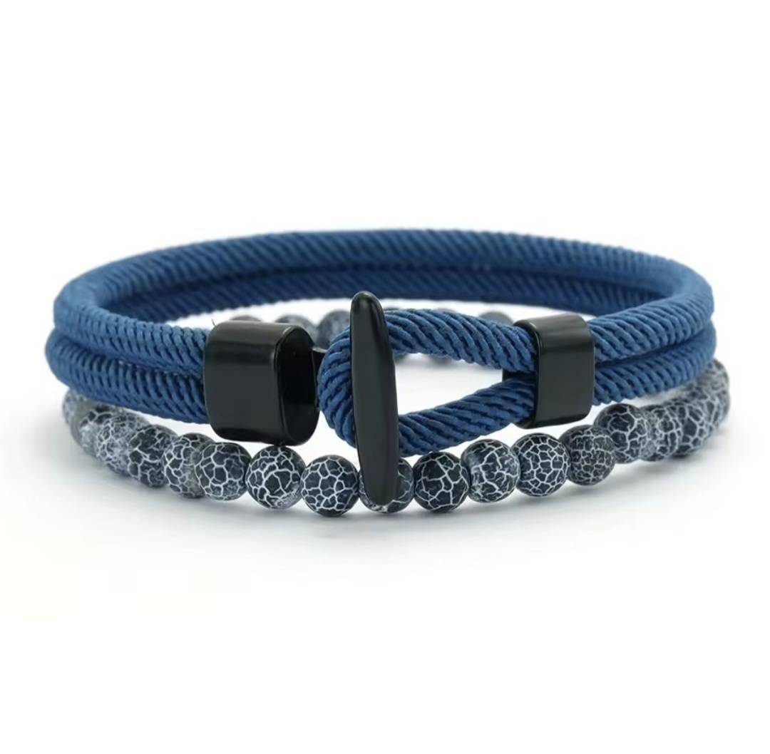 Double layer stone bracelet by GIORGIO MARENO featuring smooth stones and adjustable clasp on a neutral background.